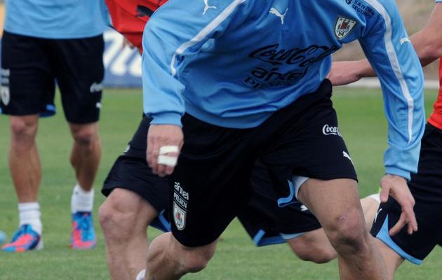 L'attaquant de l'Uruguay, Luis Suarez, lors d'une séance d'entraînement avec la Celeste le 19 mars 2013 [Miguel Rojo / AFP]