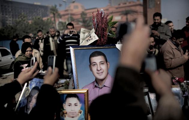 Rassemblement organisé grâce à des appels lancés sur Twitter et Facebook en hommage à des victimes de la répression des manifestations hostiles à Hosni Moubarak, au Caire le  14 février 2011 [Marco Longari / AFP/Archives]