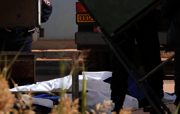 Corps de victimes retrouvés sur le complexe gazier d'In Amenas dans le sud-est de l'Algérie, le 21 janvier 2013 [Farouk Batiche / AFP]