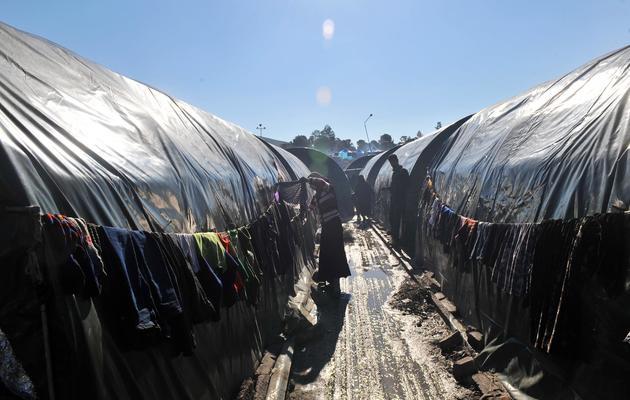 Des réfugiés syriens le 18 mars 2013 dans le camp Bab al-Hawa à la frontière entre la Syrie et la Turquie [Bulent Kilic / AFP/Archives]