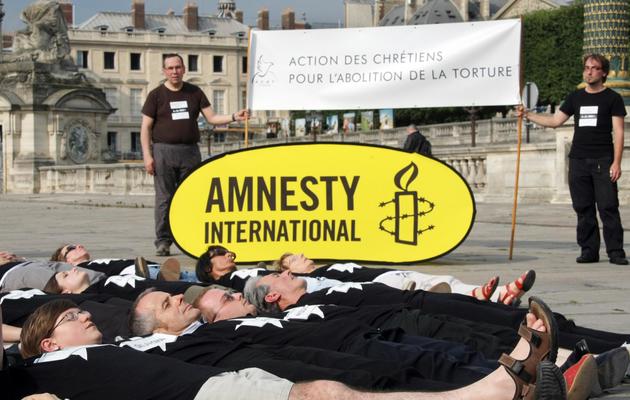 Rassemblement de militants d'Amnesty International à Paris, le 2 juillet 2009 [Emilien Cancet / AFP/Archives]