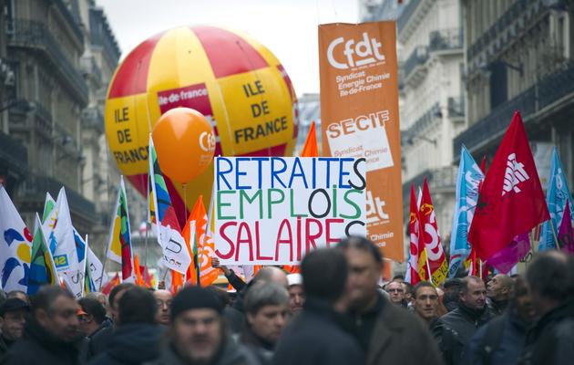 Des manifestants défilent contre la réforme "Fillon" des retraites, le 23 novembre 2010 à Paris [Lionel Bonaventure / AFP]