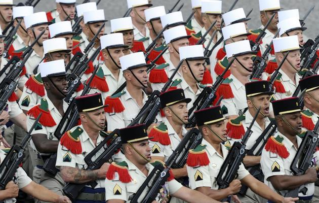 Des soldats du 4è régiment étranger de Castelnaudary défilent le 14 juillet 2011 sur les Champs-Elysées [Miguel Medina / AFP]
