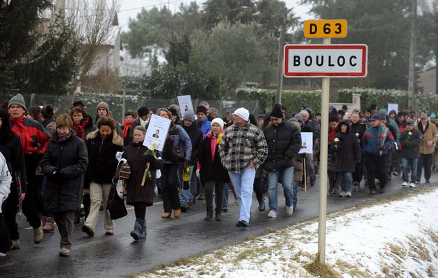 Des personnes participent à une marche blanche, le 14 février 2012 dans le village de Bouloc, un an après la disparition de Patricia Bouchon [Remy Gabalda / AFP/Archives]