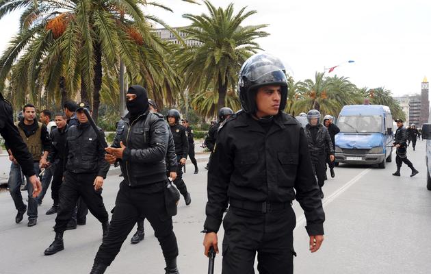 Des policiers anti-émeutes à Tunis [Fethi Belaid / AFP/Archives]