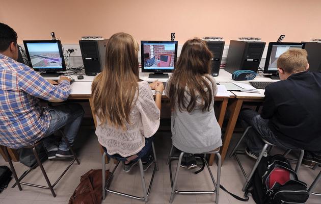 Des élèves devant des ordinateurs le 10 octobre 2012 dans une école de Selestat [Frederick Florin / AFP/Archives]