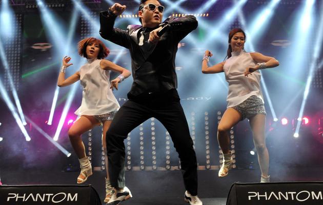 Le Coréen Psy lors d'une chorégraphie pour sa chanson "Gangnam Style", lors d'un concert en février 2013 [Ozan Kose / AFP/Archives]