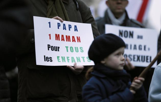 Des opposants au mariage pour tous et à l'adoption homoparentale, le 4 avril 2013 à Paris [Kenzo Tribouillard / AFP/Archives]