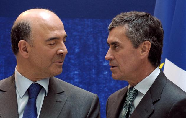 Pierre Moscovici et Jérôme Cahuzac le 20 mars 2013 à Paris [Eric Piermont / AFP/Archives]