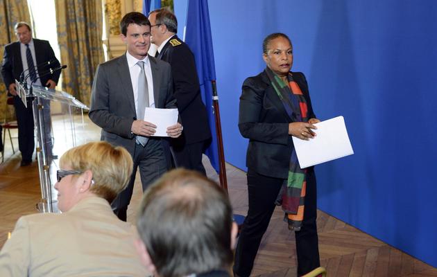 Manuel Valls et Christiane Taubira le 13 mai 2013 à Lyon [Philippe Merle / AFP]