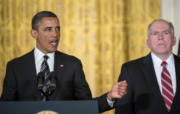 Le président américain Barack Obama annonce la nomination de John Brennan (d) au poste de directeur de la CIA, le 7 janvier 2013 à la Maison Blanche à Washington [Brendan Smialowski / AFP/Archives]