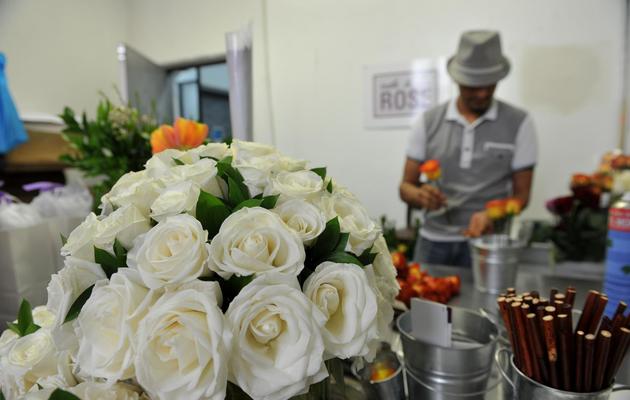 Une création de bouquet de roses à "Ode à la rose", le 10 mai 2013, à New York [Stan Honda / AFP]