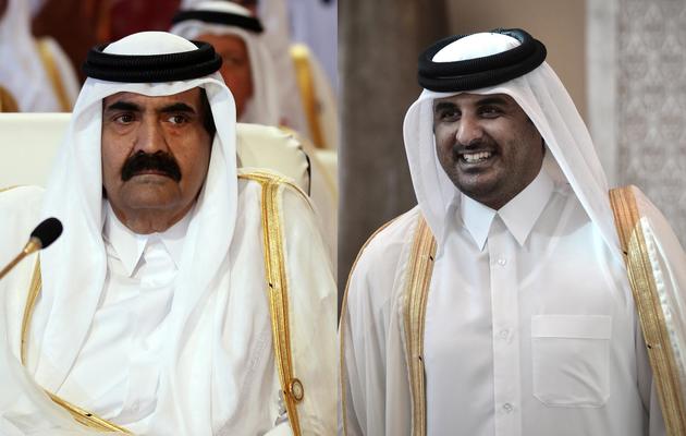 Montage des portraits de l'émir du Qatar, cheikh Hamad ben Khalifa Al Thani, et de son fils le prince héritier Tamim, le 26 mars 2013 à Doha [Karim Sahib/Mohammed al-Shaikh / AFP/Archives]