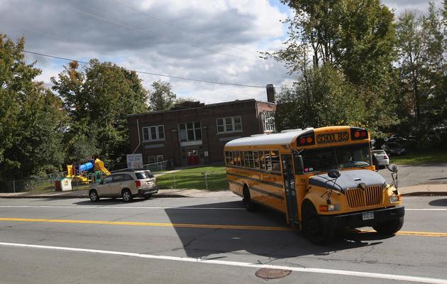 Un bus scolaire ramène des écoliers à leur maison à Woodbourne, dans l'Etat de New York, le 20 septembre 2012 [John Moore / Getty/AFP]