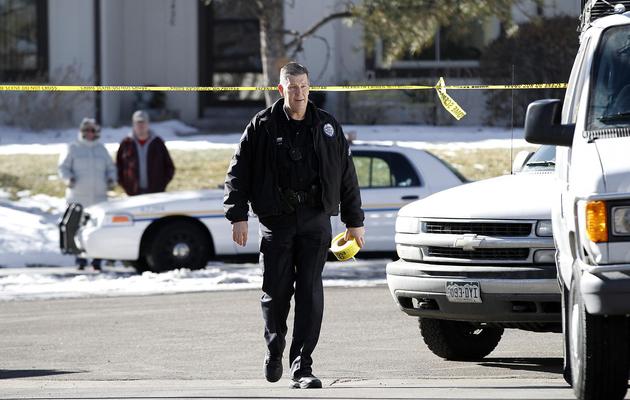 Un policier sur les lieux d'une prise d'otage mortelle, le 5 janvier 2013 à Aurora dans le Colorado [Marc Piscotty / AFP/Getty Images]