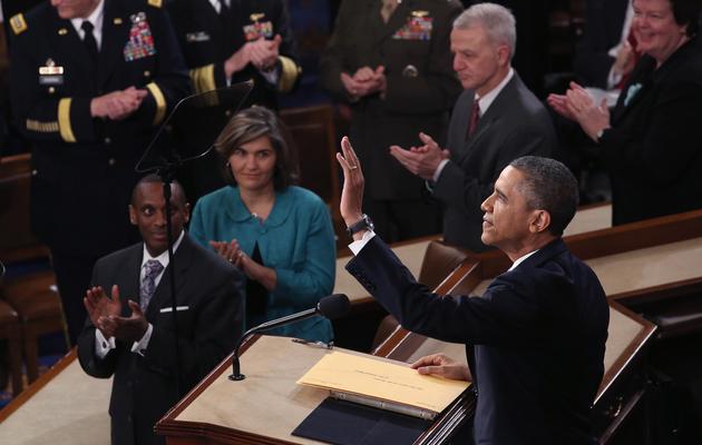 Barack Obama salue l'assistance à l'issue   de son discours sur l'état de l'Union le 12 février 2013 à Washington [Chip Somodevilla / AFP/Getty Images]