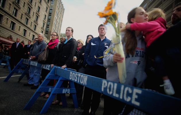 Une minute de silence observée près du site de l'attentat de Boston, le 22 avril 2013 [Mario Tama / Getty Images/AFP]