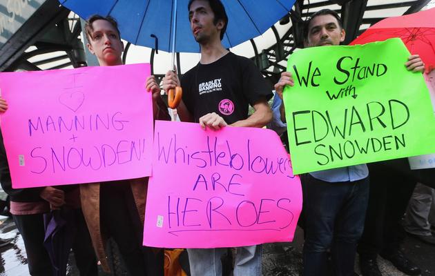 Des supporters d'Edward Snowden sont rassemblés sur une place de New York, le 10 juin 2013 [Mario Tama / Getty Images/AFP]