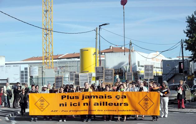 Des membres du comité "Plus jamais ca ni ici ni ailleurs" manifestent le 21 septembre 2011 à Toulouse [Remy Gabalda / AFP/Archives]