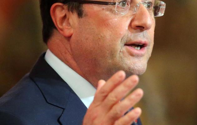 Le président François Hollande au palais de l'Elysée le 22 octobre 2013 à Paris [Michel Euler / POOL/AFP/Archives]