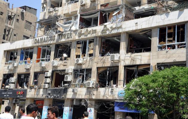 Photo de l'agence de presse syrienne officielle Sana montrant un hôtel détruit de Damas, le 30 avril 2013 [- / SANA/Sana/AFP/Archives]