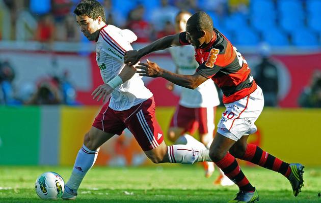 Le footballeur portugais Deco (g), qui a évolué sous le maillot du club brésilien de Fluminense après avoir notamment joué pour Porto et le Barça avec lesquels il a respectivement soulevé une Ligue des Champions, a raccroché les crampons en 2013 [Vanderlei Almeida / AFP/Archives]