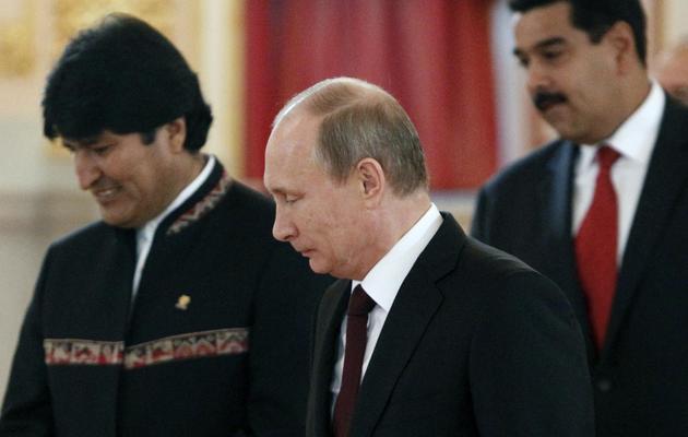 Le président bolivien Evo Morales, le président russe Vladimir Poutine et le président vénézuélien Nicolas Maduro, au Kremlin, à Moscou, le 1er juillet 2013 [Maxim Shemetov / Pool/AFP]