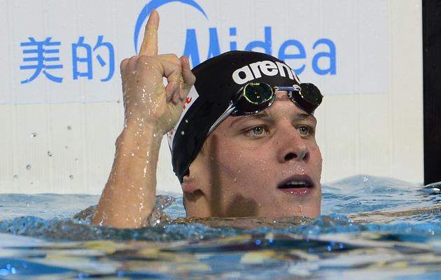 Le Hongrois Daniel Gyurta célèbre sa victoire sur 200 m brasse en finale des Mondiaux de natation à Barcelone, le 2 août 2013. [Lluis Gene / AFP]