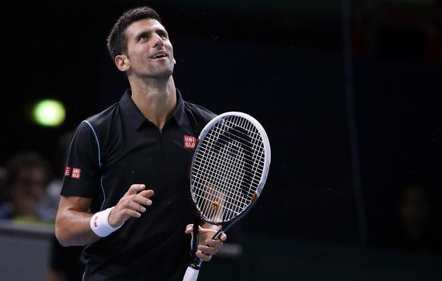 Le Serbe Novak Djokovic lors de son match des quarts de finale du Masters 1000 de Paris-Bercy contre le Suisse Stanislas Wawrinka, le 1er novembre 2013. [KENZO TRIBOUILLARD / AFP Photo]