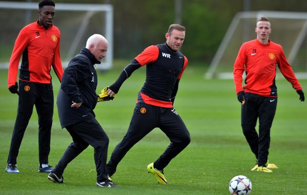 L'attaquant de Manchester Wayne Rooney (2e d) participe normalement à l'entraînement de son équipe au centre de Carrington, le 8 avril, à la veille du quart de finale retour face au Bayern à Munich [ / AFP]
