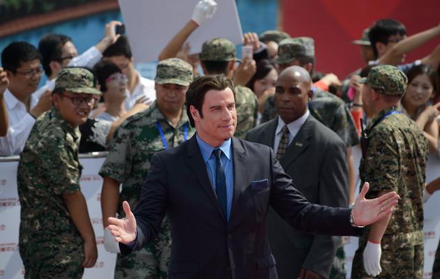 John Travolta à la cérémonie de lancement de la cité du cinéma à Qingdao, le 22 septembre 2013 en Chine [Ed Jones / AFP]