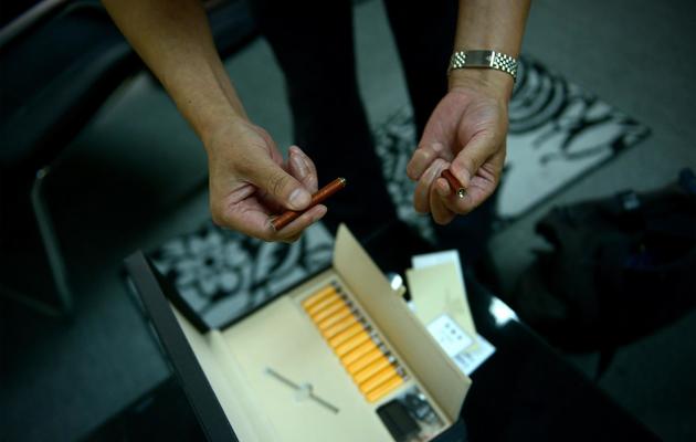 La cigarette électronique chauffe une solution de nicotine et la transforme en vapeur [Wang Zhao / AFP/Archives]