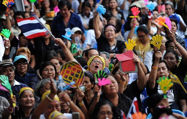 Des manifestants de l'opposition rassemblés à Bangkok contre une loi d'amnistie qui permettrait le retour de l'ex-Premier ministre en exil Thaksin Shinawatra, le 2 novembre 2013 en Thaïlande [Christophe Archaumbault / AFP]