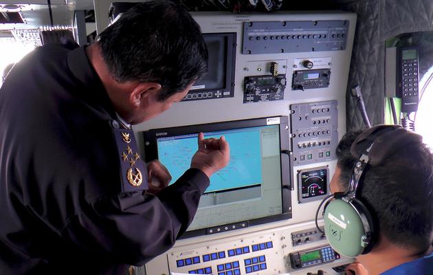 Photo fournie par les services maritimes malaisiens d'enquêteurs essayant de localiser le Boeing le 9 mars 2014  [Malaysian Maritime Enforcement / Malaysian Maritime Enforcement/AFP/Archives]