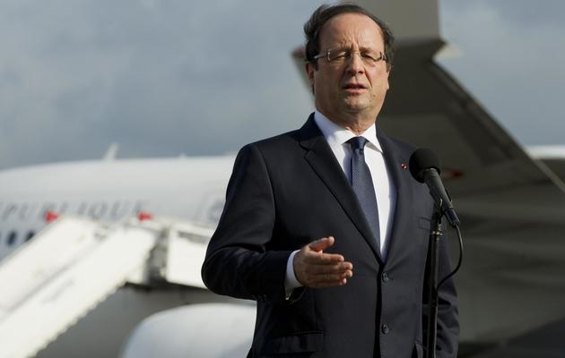 Le président François Hollande à son arrivée à Cayenne le 13 décembre 2013 [Alain Jocard / AFP]
