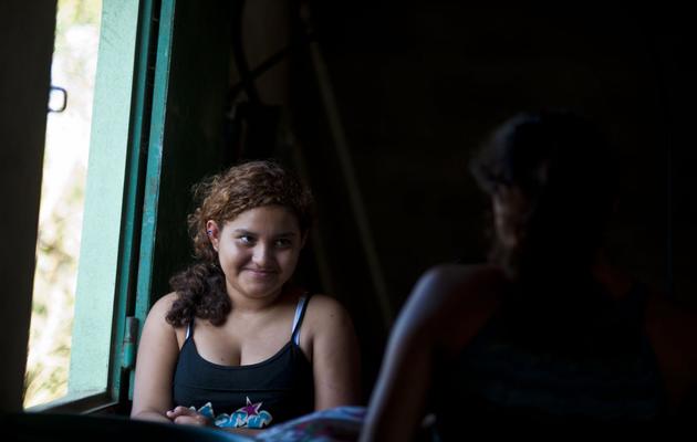La fille de Jose Salvador Alvarenga, Fatima Mabea Alvarenga, à Garita Palmera, au Salvador, le 4 février 2014 [Jose Cabezas / AFP]