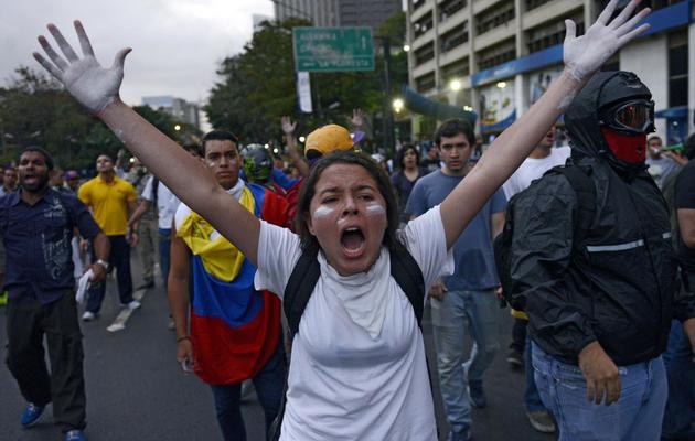 Des étudiants dans la rue le 17 février 2014 à Caracas [Leo Ramirez / AFP]