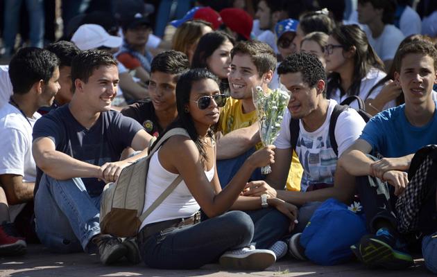 Des étudiants manifestent contre le gouvernement de Nicolas Maduro, le 20 février 2014 à Caracas [Juan Barreto / AFP]