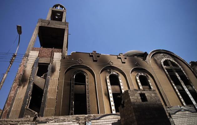 Vue exérieure en date du 27 août 2013 d'une église copte incendiée à Minya [Gianluigi Guercia  / AFP/Archives]