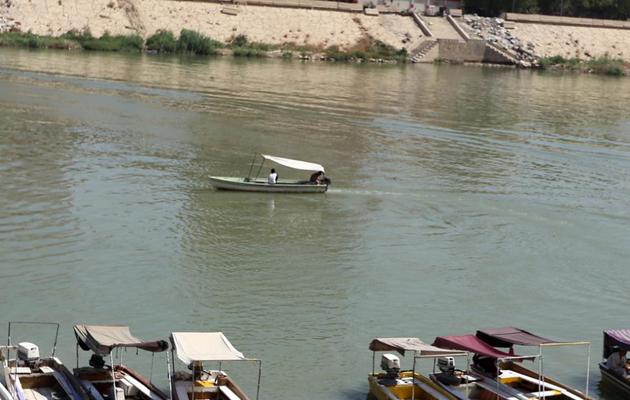 Des bateaux sur le Tigre, le 11 septembre 2013 à Bagdad, en Irak [Sabah Arar / AFP]
