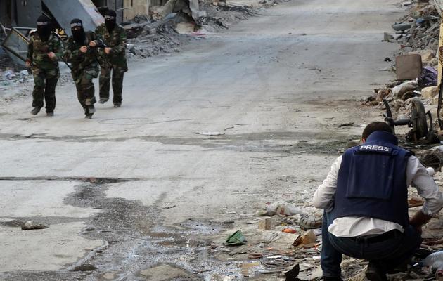 Des combattantes rebelles à Alep le 4 octobre 2013 [Karam Al-Masri / AFP]