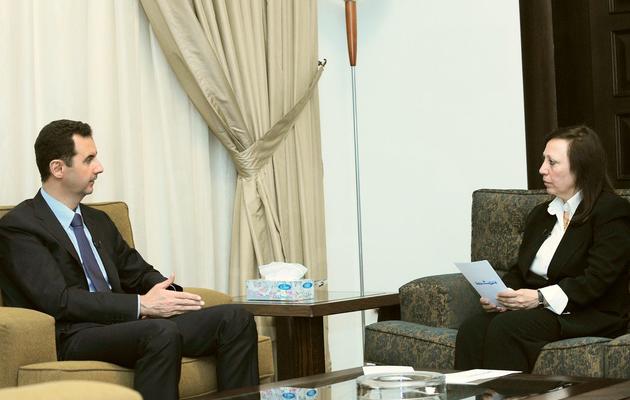 Le président syrien Bachar al-Assad lors d'une interview, sur une photo fournie par l'agence syrienne Sana le 6 octobre 2013 [- / SANA/AFP]