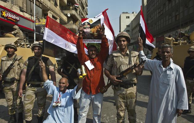 Des égyptiens manifestent au Caire pour le 40e anniversaire de la guerre israélo-arabe de 1973 [Khaled Desouki / AFP]