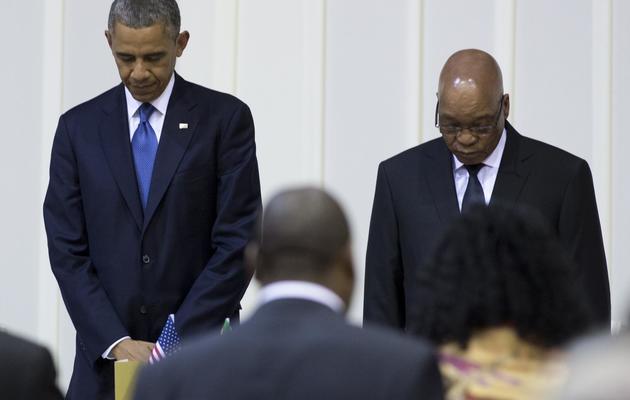 Barack Obama et Jacob Zuma lors d'un dîner de gala à Pretoria, le 29 juin 2013 [Saul Loeb / AFP]