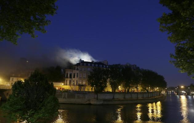 L'Hôtel Lambert ravagé par un incendie le 10 juillet 2013 à Paris [Kenzo Tribouillard / AFP]
