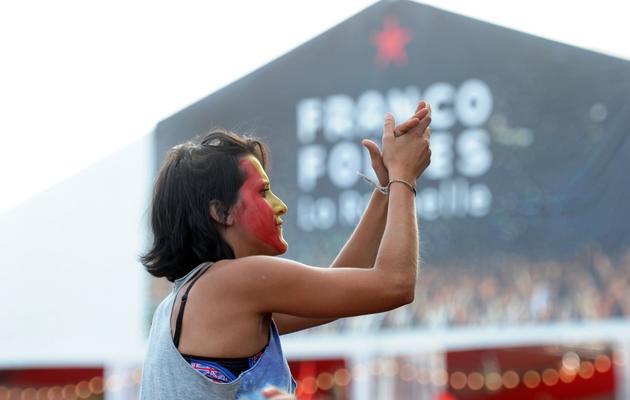 Une jeune femme lors d'un concert le 13 juillet 2013 aux Francofolies de La Rochelle [Xavier Leoty / AFP Photo]