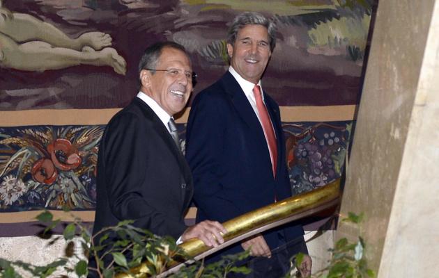 Sergueï Lavrov et John Kerry, le 13 septembre 2013 à Genève lors des discussions sur l'arsenal chimique de la Syrie [Philippe Desmazes / AFP]