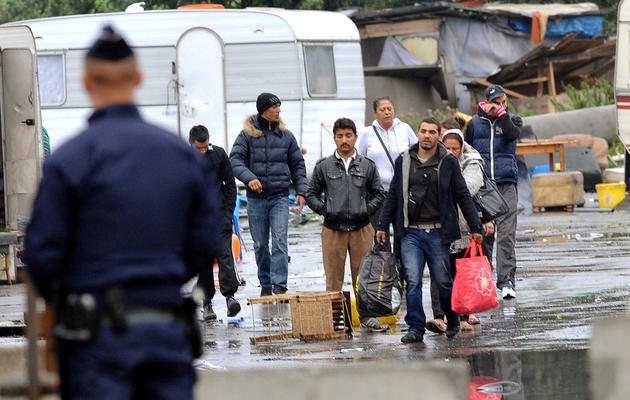 Evacuation par la police d'un campements de Roms, le 18 septembre 2013 à Lille [Denis Charlet / AFP]