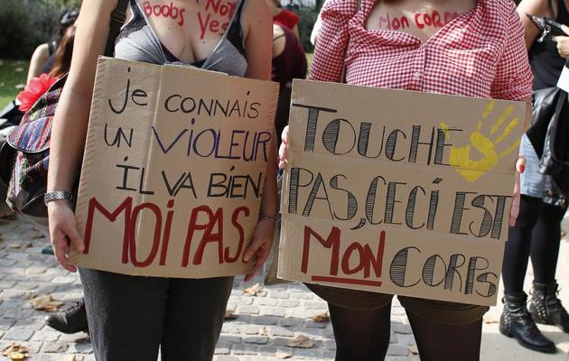 Des militantes participent à la "Marche des salopes" à Paris le 28 septembre 2013 [Thomas Samson / AFP]