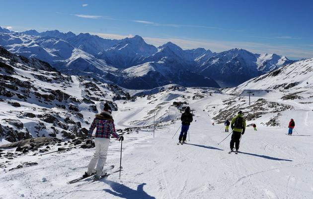 Des skieurs dans la station de ski de l'Alpe d'Huez (Isère), le 16 novembre 2013 [Jean-Pierre Clatot / AFP]